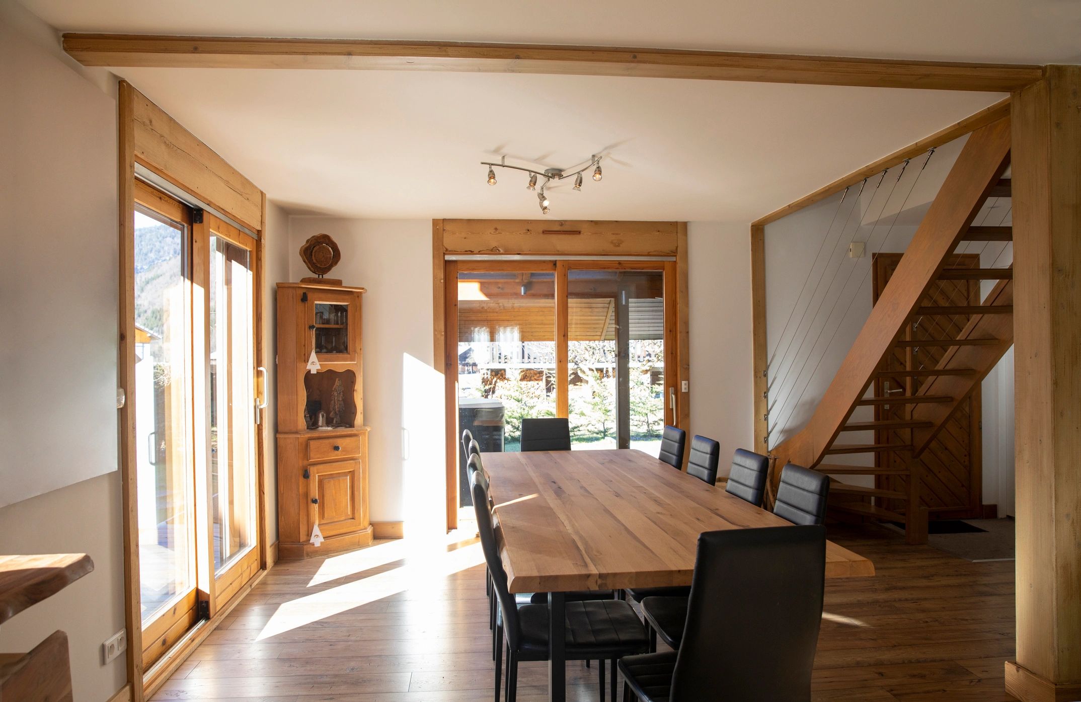 Bright interior room with large windows and natural light