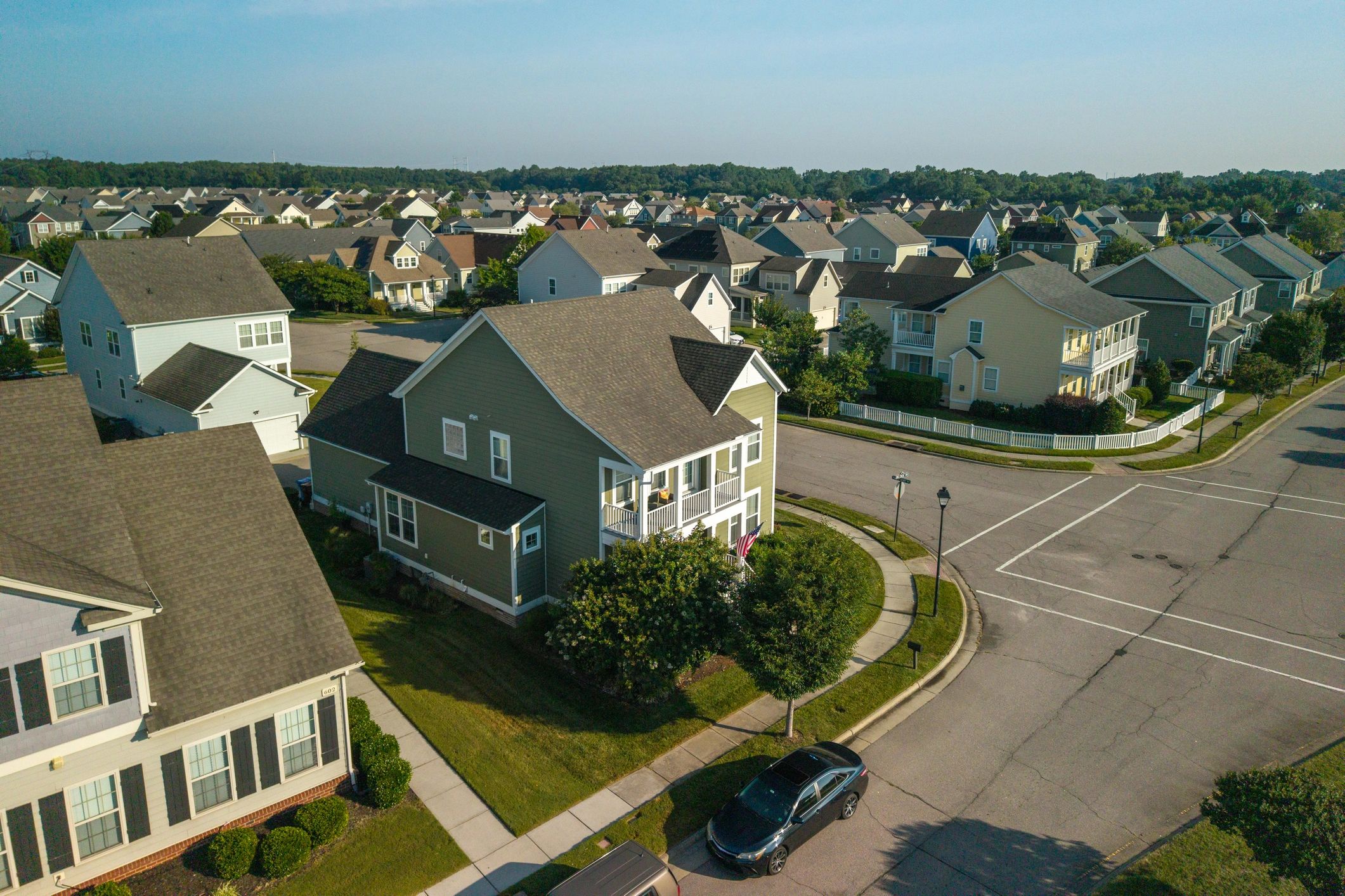 Residential neighborhood exterior representing attached carport planning