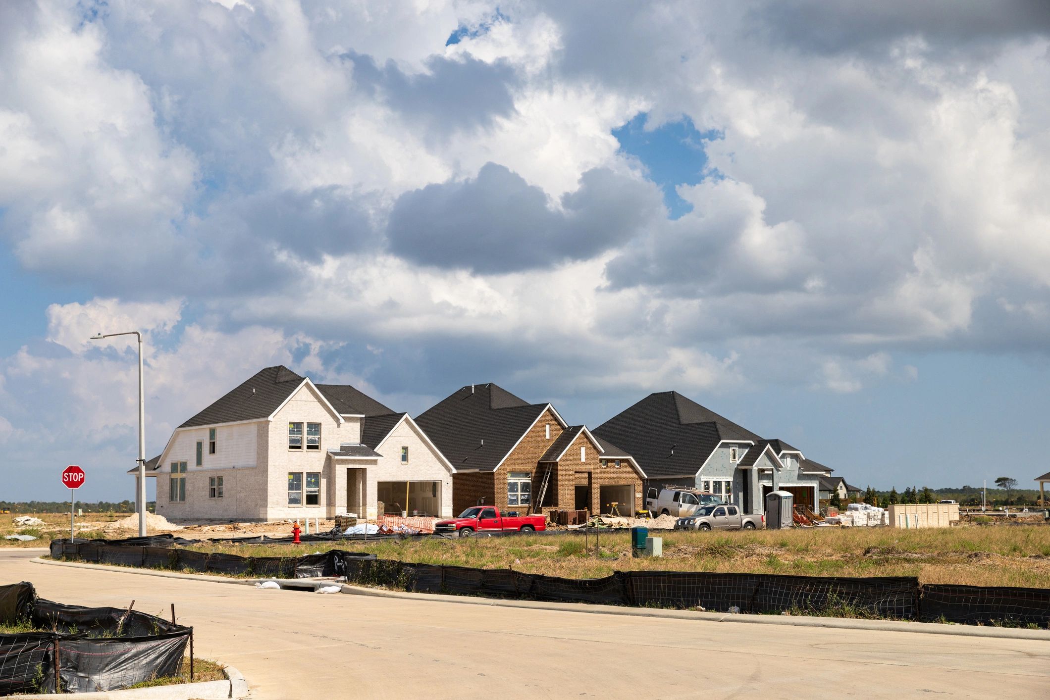 Suburban homes under construction representing growing Central Texas communities